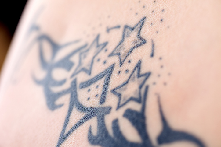 a tattoo on his arm